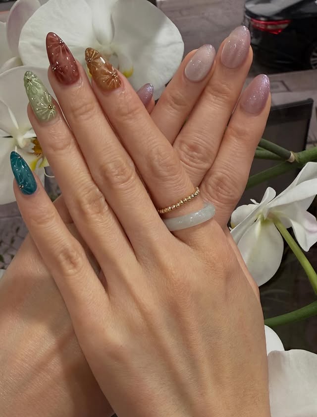 Hand painted floral summer nail art on almond nails at X Nails